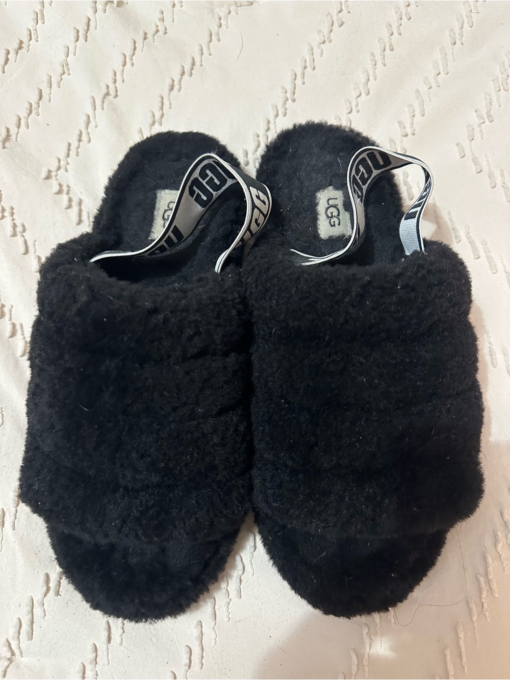 UGG Women’s Black Shearling Slippers with Logo Heel Strap